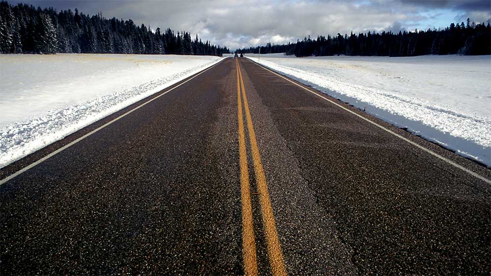 Two lane highway in mountains of Colorado.